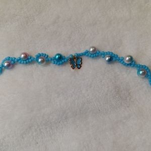 Handmade wire beaded double strand bracelet with butterfly charm